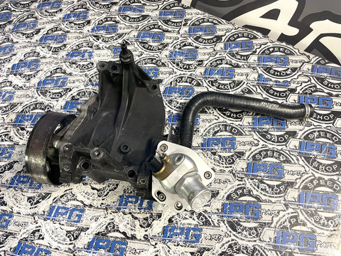 Used USDM K24a2 Water Pump Housing with Pump, K-Tuned Thermostat Housing and Hose